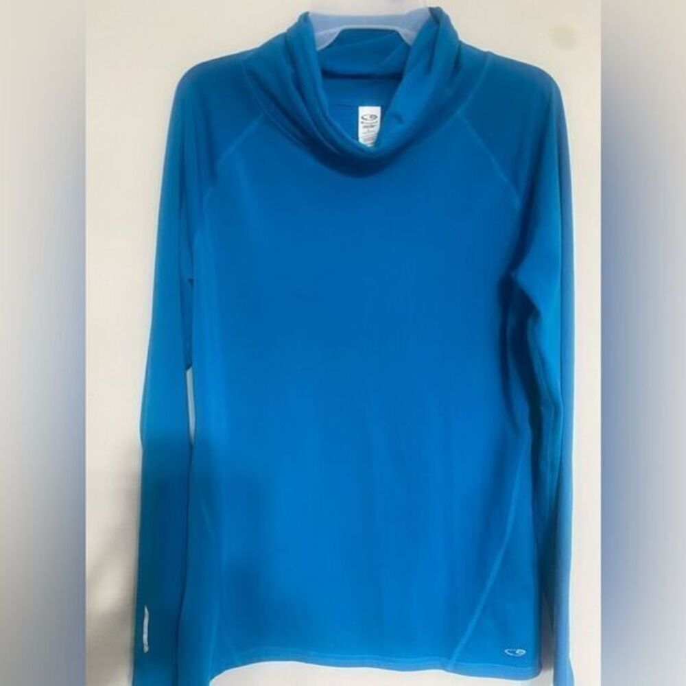 - - Women’s blue long sleeve, champion, athletic shirt, size‎ large